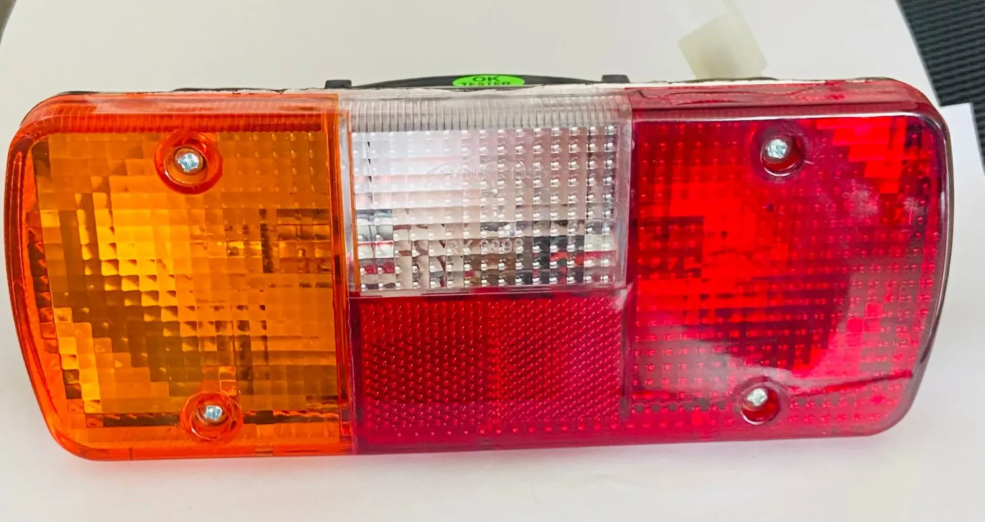 [2XV00CB5050AA] Tail Light LF (Baxy)